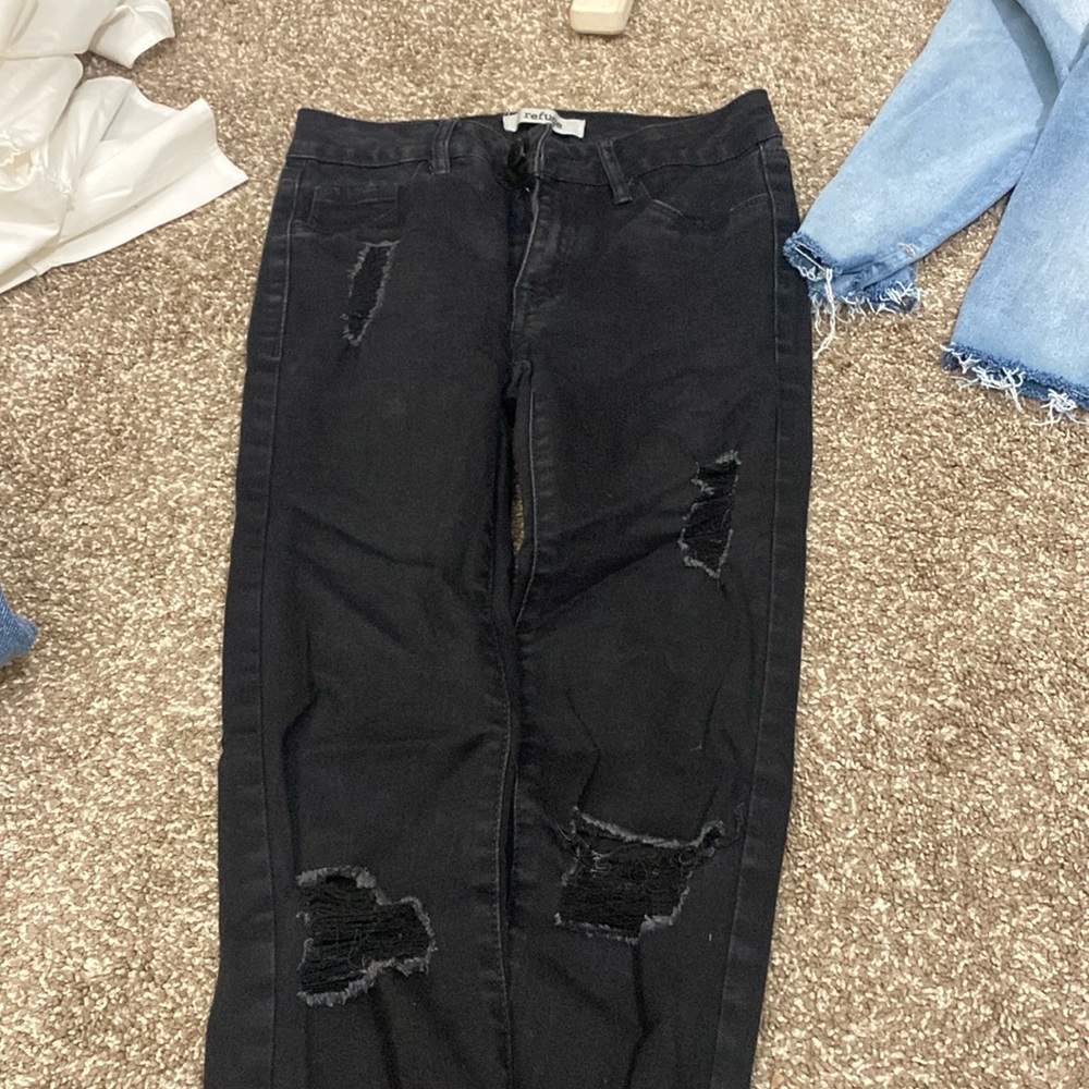 Black distressed skinny jeans